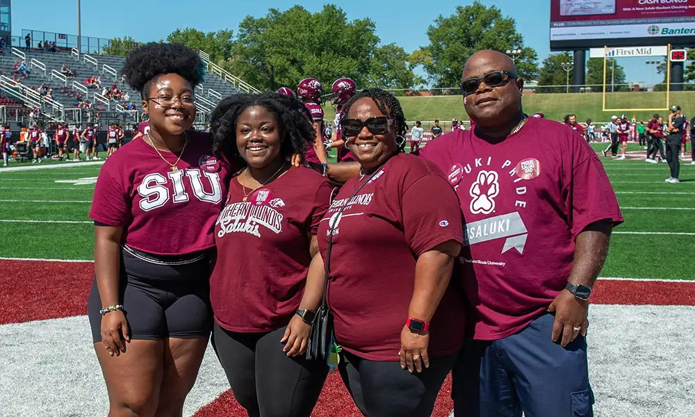 legacy family on football field